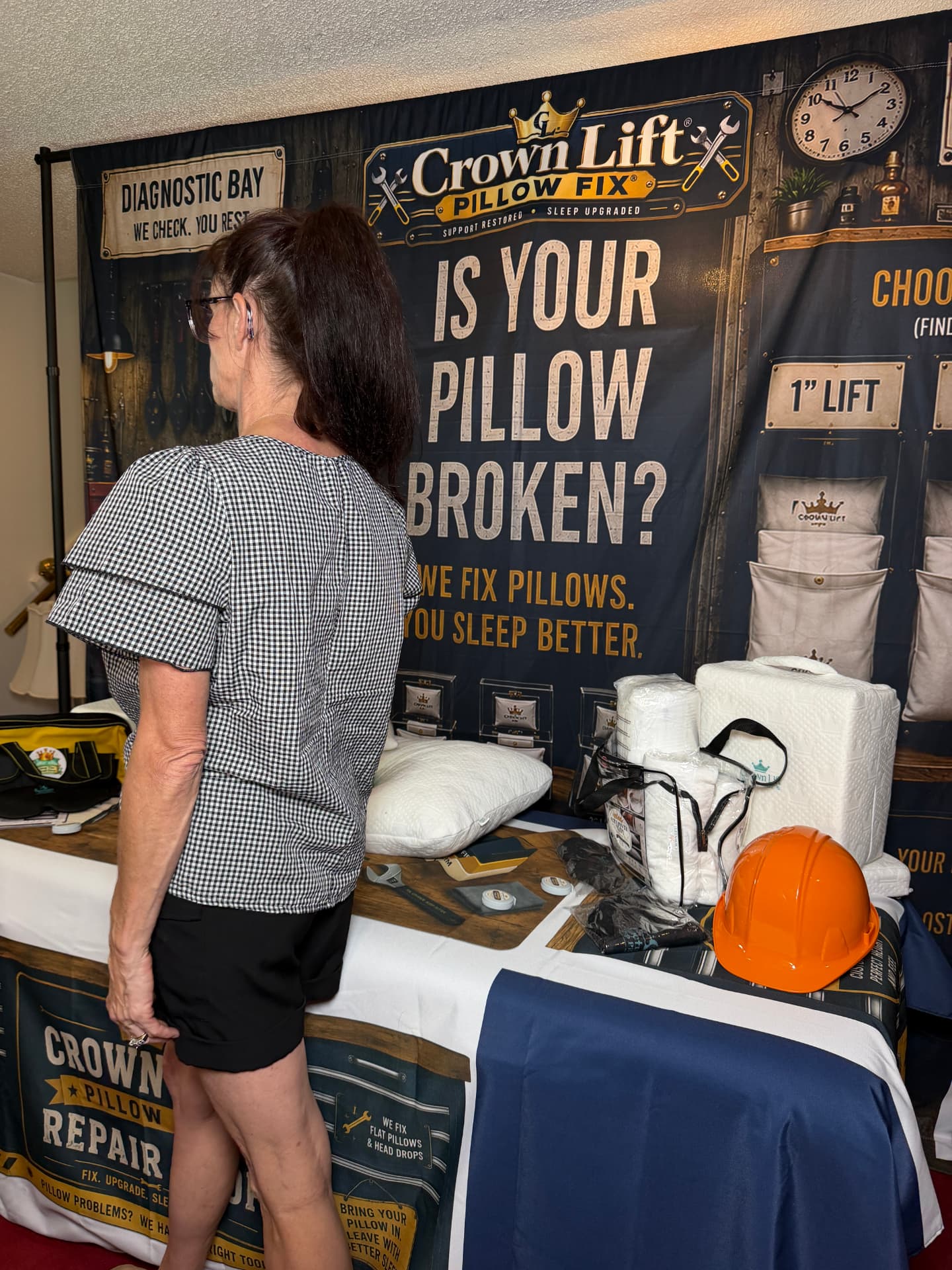 Danielle Canter speaking with a visitor during a Crown Lift demonstration